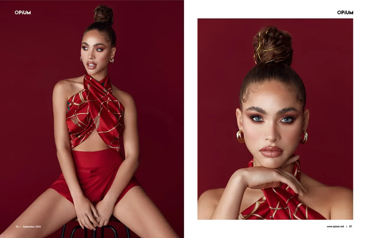 Model posing in striking red outfit