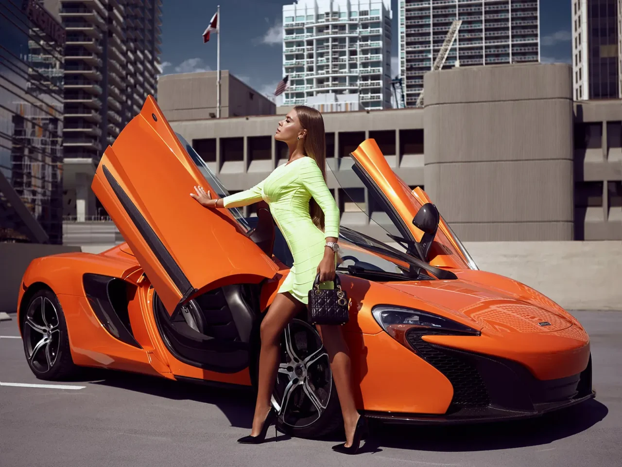 Advertising campaign: girl posing near McLaren