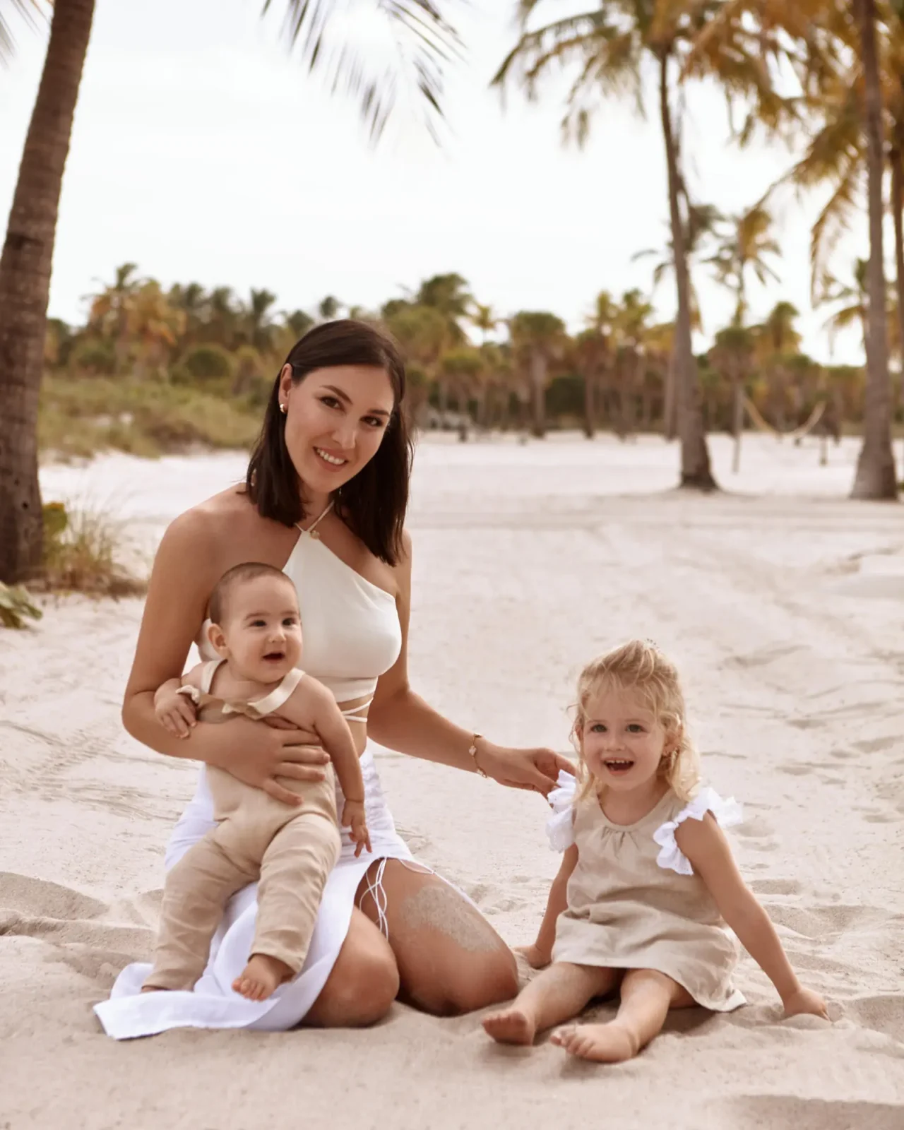 Mother and children at beach